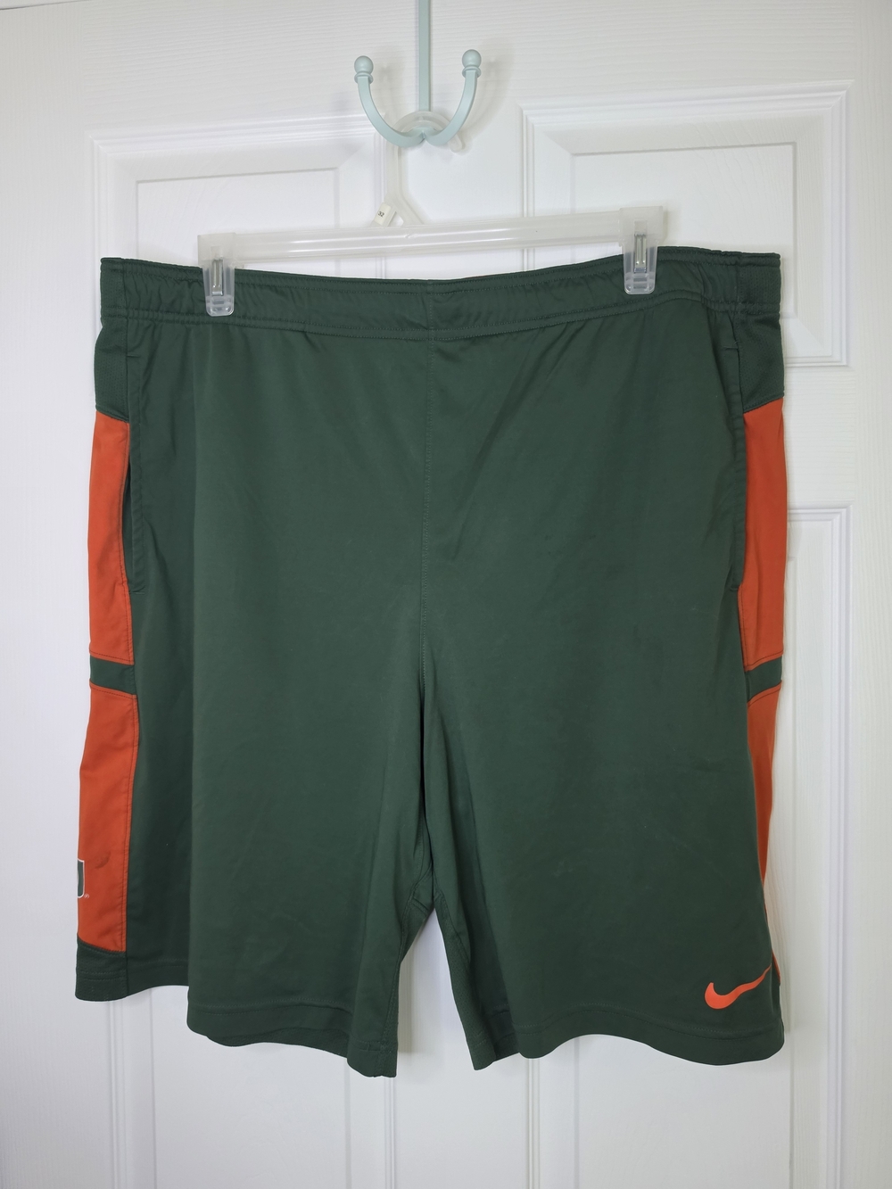Nike Men’s Green University Of MIAMI Shorts with Orange Accents